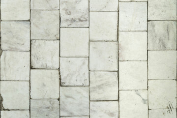 Old white marble tile texture background