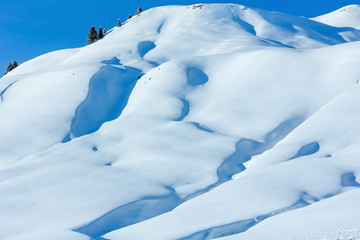 Fototapeta na wymiar Winter snowy hill.