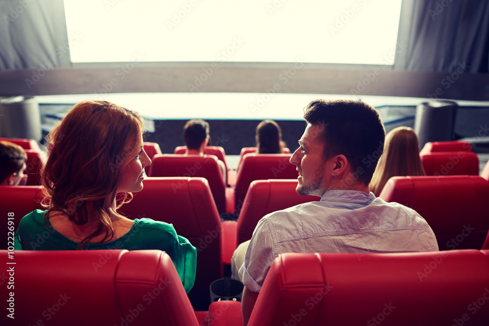 Poster happy couple watching movie in theater or cinema