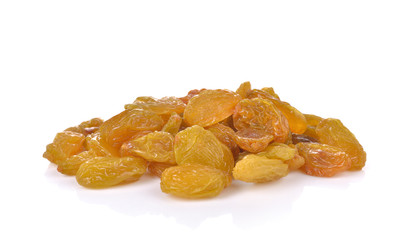 yellow raisins  on white background