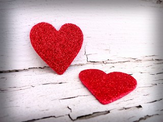 Romantic vignette background with two Valentine's hearts