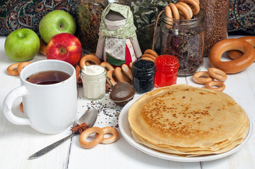 Maslenitsa festival meal. Pancake with caviar and tea