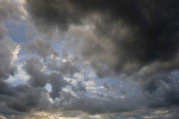 rain cloud on sunset dramatic sky background
