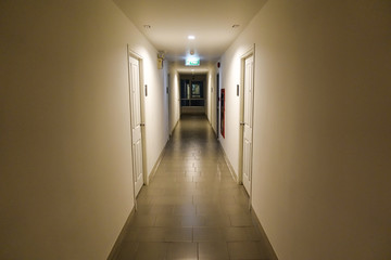 warm corridor in the hotel with old carpet