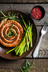 Grilled sausage with asparagus and rosemary