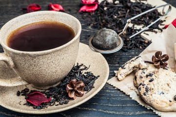cup of tea and cookies with chocolate