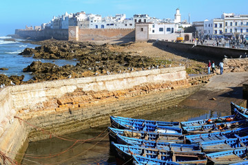 Essaouira, Morocco -  January 5, 2016: Coastal town Essaouira with sea and blue boats  