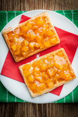 Waffles with peach jam.