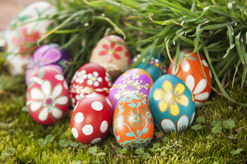 Colourful easter eggs on grass