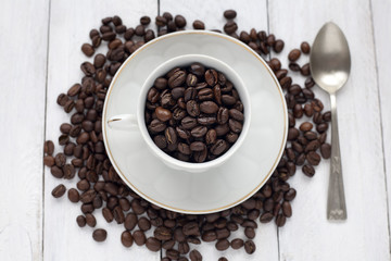 Cup with coffee beans