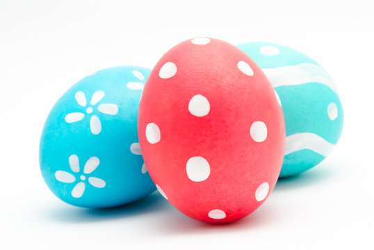 Three colorful handmade easter eggs