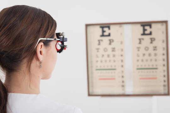 The patient is checked by sight with a special optometric instru