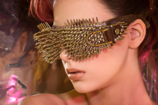 \young Girl With Red Hair Wearing Glasses With Gold Spikes In Th