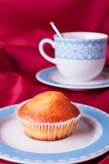 Cake and blue tea cup