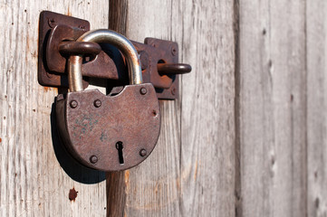 Old and rusty padlock.