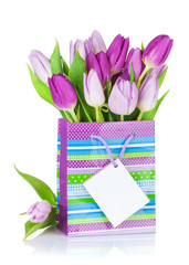 Purple tulip bouquet in gift bag