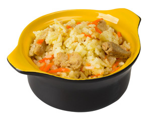 Cup with pilaf on a white background.
