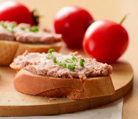 Sandwich with paste and green onions.