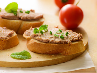 Sandwich with paste and green onions.