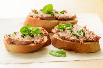 Sandwiches with paste and green onions.