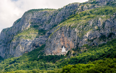 Fototapeta na wymiar Mountain landscape with Ostrog monastery. One of the most popular touristic spots in Montenegro.