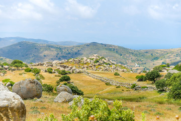 Fototapeta na wymiar Wild, rocky landscape on the island of Tinos, Greece.