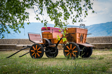 Fototapeta na wymiar Retro style horsedrawn carriage in the Ostrog monastery. Popular touristic destination in Montenegro.