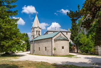 Fototapeta na wymiar Old stone chapel, part of Ostrog monastery complex. Niksic, Montenegro