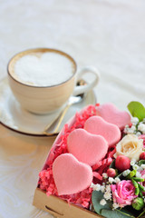 French macaroon heart-shaped Valentine's Day, the box with flowe