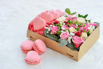 French macaroon heart-shaped Valentine's Day, the box with flowe