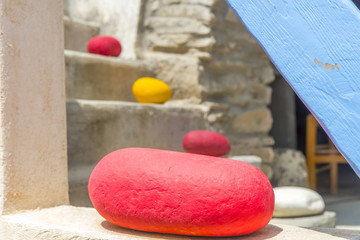 Decorative colorful pebbles in houses in Mykonos, Greece.