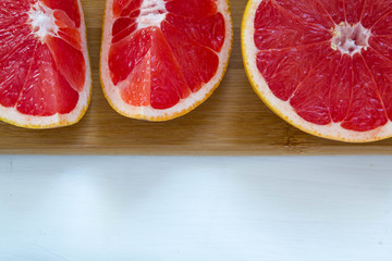 fresh grapefruit on white boards, food wooden background, orange, citrus, frui