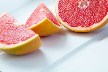 fresh grapefruit on white boards, food wooden background, orange, citrus, frui