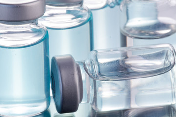  medical ampoules on a black background