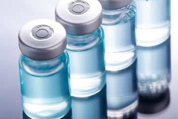  medical ampoules on a black background