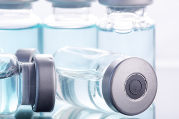  medical ampoules on a black background