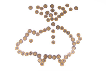 Coins thrown into a piggy bank