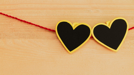 heart blank paper card on wooden background.