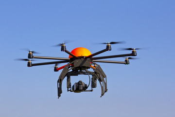 Flying octocopter for video and photo production. 