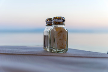 Traditional tavern in Santorini. Romantic setup by the sea.