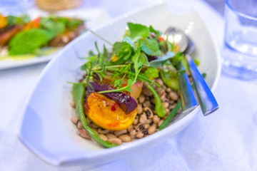 Traditional greek dish served with fresh vegetables.
