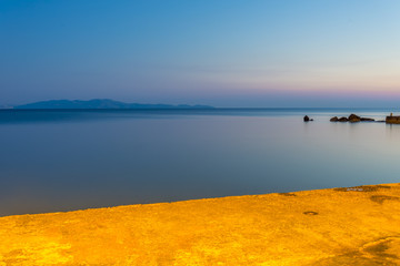 Impressive colourful sunset in Santorini island during summer.