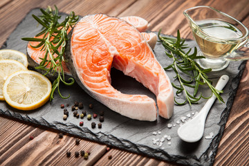 Fresh salmon on old wood