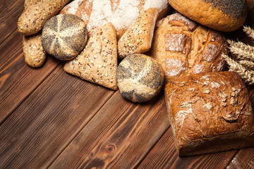 Bread assortment on wooden surface