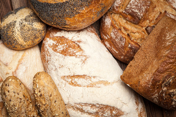 Bread assortment on wooden surface