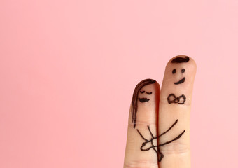 valentine card with two fingers represent hugging couple with heart and be my valentine description