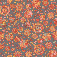 Vector floral pattern in doodle style with flowers and leaves.