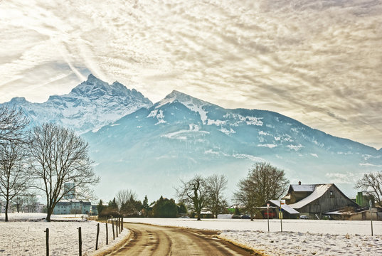 Road View of village in snow covered Switzerland