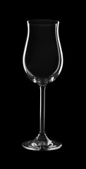Empty wine glass on black