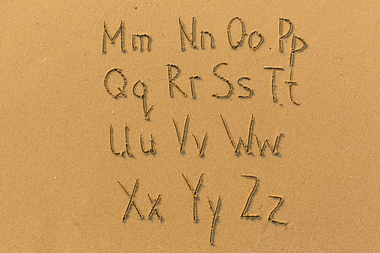 Alphabet drawn on the sand of a beach. (part two of two - from Mm to Zz)